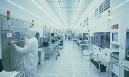 Man working in clean room (blue tone)