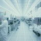 Man working in clean room (blue tone)