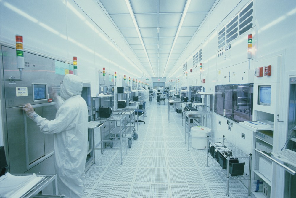 Man working in clean room (blue tone)